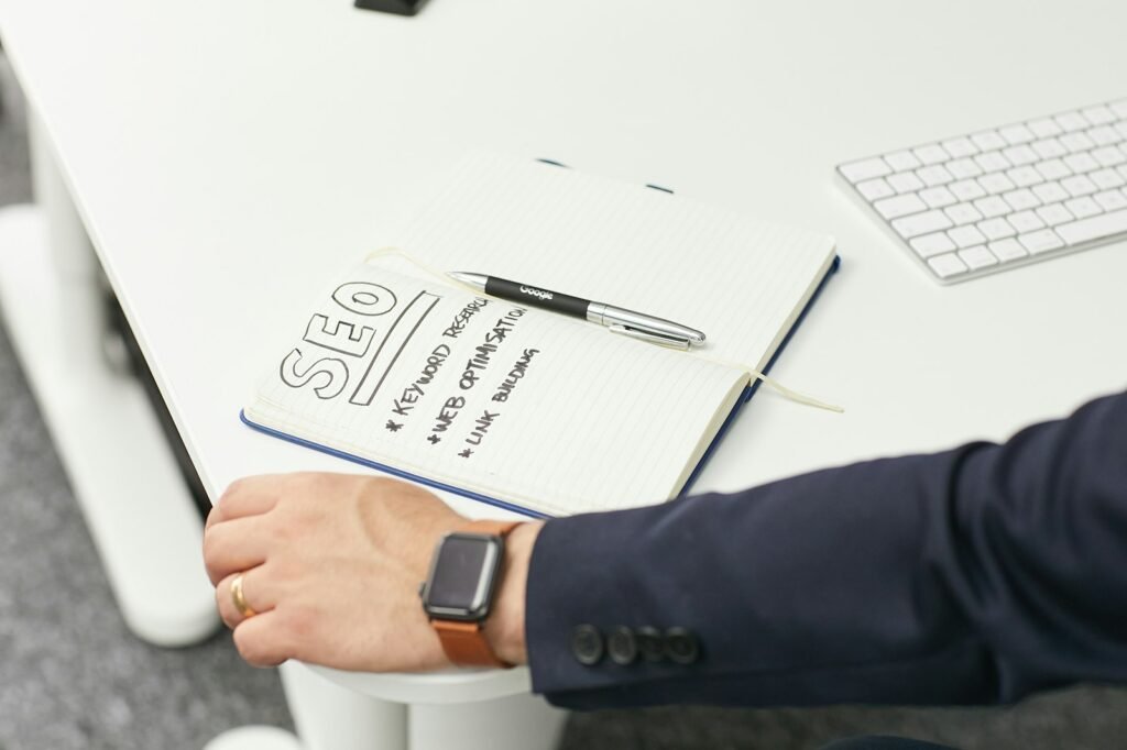 Handwritten SEO strategy notes on a desk