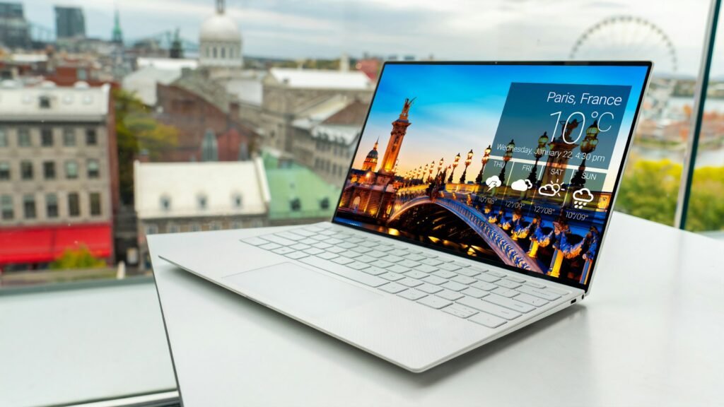 Laptop showing an AI assistant answering a question