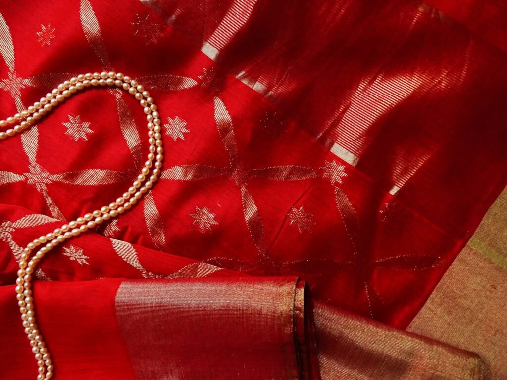 Colourful silk sarees displayed in a textile shop
