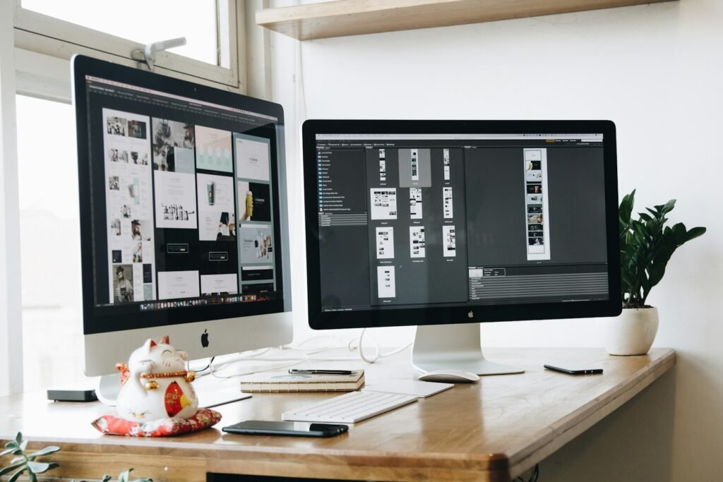 Web designer working on a website layout on a laptop